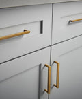 Antique Brass Cabinet Pulls Set Of 6, 5 Inch Center To Center, Minimalist Vintage Drawer Handles installed on modern white cabinetry