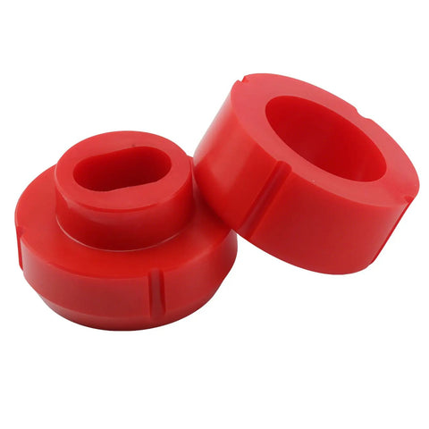 Red polyurethane bushings from Chevy 81-87 Polyurethane Body Cab Mount Bushing Kit 12 Piece Direct Fit Heavy Duty For C10 C20 K10 K20 K30 GMC