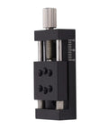 Knockout Heavy Duty Manual Linear Actuator Stage Featuring Smooth Glide Aluminum Dovetail Slide Platform and Dead Set Micro Tuning Adjustments For Real World Job Sites, close-up view with adjustment knob.