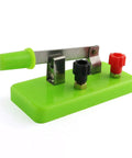 Close-up of green switch component from Circuit Learning Kit For Kids, Simple Circuit Physics Educational Box, Electrical Experiments Set
