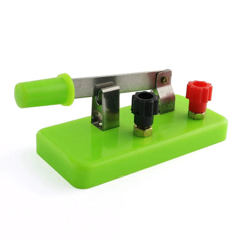 Close-up of green switch component from Circuit Learning Kit For Kids, Simple Circuit Physics Educational Box, Electrical Experiments Set