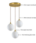 Modern Minimalist Pendant Light With White Glass Globe Shade, Premium Brass Spherical Ceiling Fixture, Three Light Hanging Lamp For Kitchen Living Room And Dining, Ultra Slick Adjustable Cord Up To Fifty Nine Inches, Swivel Canopy, Flush Mount