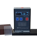 Heavy Duty Digital Surface Roughness Tester Delivering Legit Ra Rz Measurements For All Metal And Nonmetal Finishes With Sweet High Speed Dsp Processing And Knockout Aluminum Build For Daily Shop Grind on workstation with OLED display.