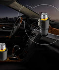 Portable Electric Beverage Warmer And Cooler Quiet Office Desk Cup Heater Chiller in a car console, holding a can, sleek design.
