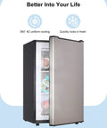 Slick 3.2 Cu Ft Upright Mini Freezer In Silver With No Fuss Design And Rapid Cool Down For Apartments Rv Trailers And Home Bars open showing food inside.