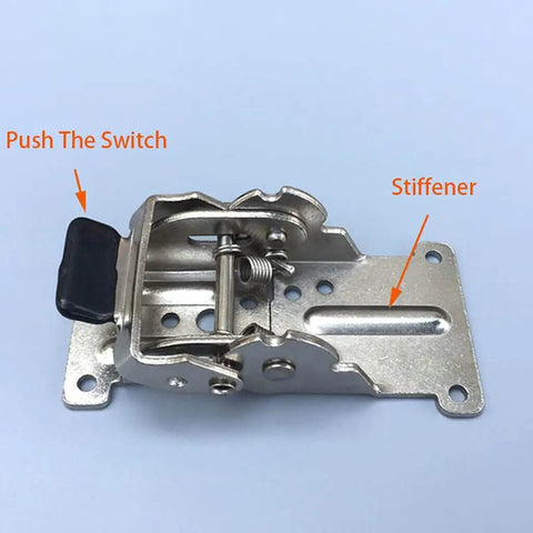 Silver self-locking folding hinge for tables and cabinets showing switch and stiffener, made of heavy-duty 2.5 mm cold-rolled steel.