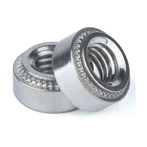 Top Notch M3 Self Clinching Press In Nuts With Rock Solid Serrated Flange Hefty Crimped Rivet Inserts For Server Racks And Home Shop Builds Vibration Proof No Wiggle Easy Setup 50 Count Pack, close-up view of two nuts.
