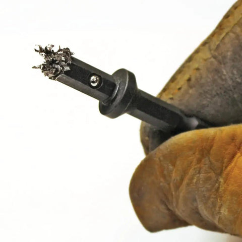 Reversible Hex Chuck Driver 1/4 Inch And 5/16 Inch Two Pack showing magnetic tip holding metal debris.