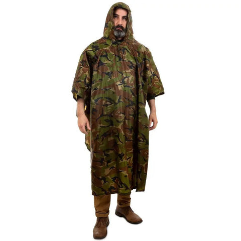 Man wearing Ultra Lightweight Ripstop Nylon Rain Poncho With Adjustable Hood Camouflage Pattern Ultra Packable Into Included 8x4 Stuff Sack
