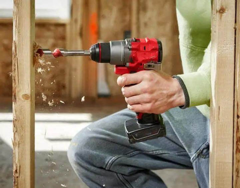 Compact 12V Cordless Drill Driver Kit With Brushless Motor And Heavy Grip Chuck Compatible With Milwaukee M12 Fuel Models drilling into wood.