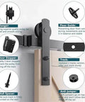 Components of Black Carbon Steel Barn Door Hardware Kit with 6-16 ft sliding track and rollers for double doors, detailed view.