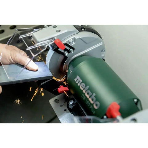 Heavy Duty 8 Inch Bench Grinder With 3600 Rpm And 5.5 Amp Motor delivering sparks while sharpening metal with protective eye shield.