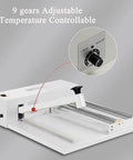 Manual heat sealer machine with adjustable temperature control and sealing lever, ideal for efficient shrink wrapping.