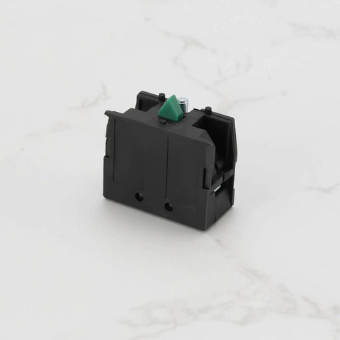 Slick Heavy Duty Green Push Button Switch Rugged 600 Volt 10 Amp Normally Open Contact Block With Silver Terminals side view