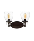 Two-light fixture from Four Light Wall Bath Vanity Fixture from Belton Collection with heirloom bronze finish and seeded glass shades.