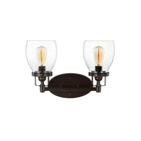 Two-light fixture from Four Light Wall Bath Vanity Fixture from Belton Collection with heirloom bronze finish and seeded glass shades.