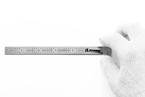 6 Inch Machinist Pocket Rule With 32nds And 64ths, Decimal Equivalents Chart, Premium Stainless Steel, Flexible, Durable Tool For Pros And DIYers In The Shop held in gloved hand