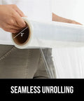 Person unrolling Heavy Duty Stretch Film Shrink Wrap For Moving And Storage, Extra Thick 60 Gauge With 500 Percent Stretch.