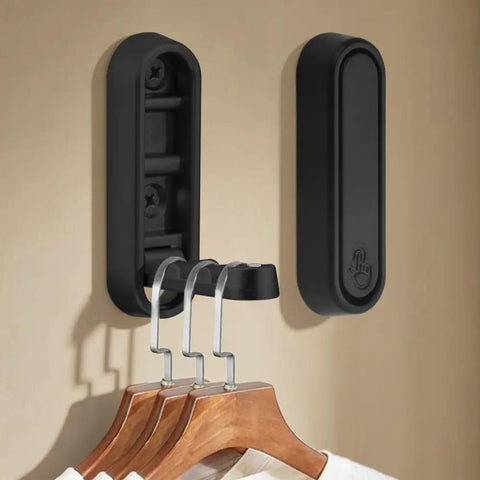 Heavy Duty Foldable Wall Hooks 4 Pack Aluminum Alloy Rustproof Flip Up Mounts With Screws Black displaying hooks on wall.