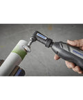 Hand using 12V Lithium-Ion Cordless Rotary Tool With Brushless Motor, Variable Speed, 3.0Ah Battery, cutting PVC pipe, close-up.