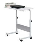 Adjustable standing computer desk with smooth locking wheels, white top, and storage for cozy living room setups.