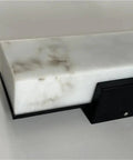 Close-up of Modern Linear Wall Sconce Imitated Marble LED Wall Light,Warmth showcasing premium marble texture and sleek black base.