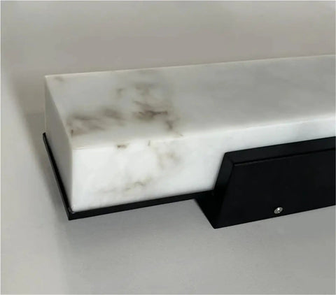 Close-up of Modern Linear Wall Sconce Imitated Marble LED Wall Light,Warmth showcasing premium marble texture and sleek black base.