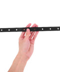 Person holding Beefy Stainless Steel Flat Brace Brackets Set for wood furniture repair, black color, showing holes for easy install.