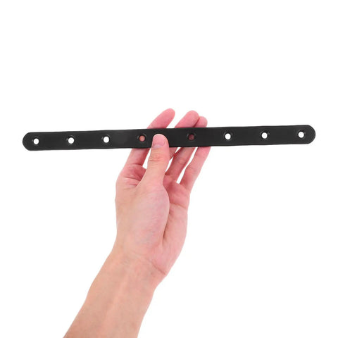 Person holding Beefy Stainless Steel Flat Brace Brackets Set for wood furniture repair, black color, showing holes for easy install.