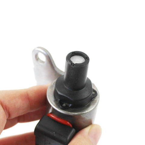 Close-up of DAYSYORE CVT transmission stepper motor with metal body and black plastic shaft, mounting tab