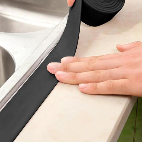 Gotcha Check Out This Durable Shower Sink Bath Wall Caulk Sealing Strip Tape With An Anti Stain Self Adhesive Design being applied.