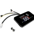 Digital display showing speed and battery level with connecting cables and components for electric vehicles.