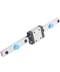 100mm linear rail guide with sliding block on aluminum rail; silver rail, gray carriage, blue adjustment caps.