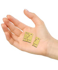Hand holding gold tone mini hinges for crafts and small boxes 60 pack with 96 screws tiny metal hinges for jewelry boxes