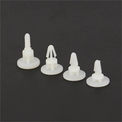 Built Tough Nylon Stand Off Spacers Set Of 200pcs For Circuit Boards With 6mm And 8mm PCB Pillar Racks Dual Locking Reinforced Wing Snap Design Keeps Components Locked In Place And Neat, white nylon PCB spacers on black background