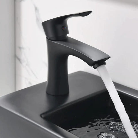 Close-up of matte black faucet flowing into basin, part of 18 Inch Corner Bathroom Sink With Matte Black Faucet Ultra Space Saver Wall Mount Vessel Sink For Tight Nooks Narrow Bathroom Vanity Or Cloakroom Porcelain Ceramic Basin With Overflow Left Hand