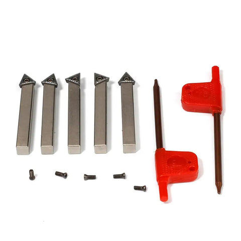 Pro Grade Mini Indexable Lathe Turning Tool Set Featuring One Quarter Inch Shank Nickel Plated Steel Holders With Five Carbide Inserts and hex wrenches.