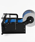 Heavy Duty Manual Bottle Labeling Machine For Cans And Plastic Glass Bottles With Widening Design For Easy Use, black metal construction.