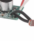 Close-up of Sound Activated Light Sensor Module Pack Of 5, Solar Powered Auto Light Switch with photoresistor and wires.