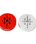 Red and silver round dovetail plate adapters for telescope and camera mounts, pro grade heavy duty metal build, side by side view.
