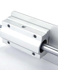 DC24V reciprocating linear actuator with aluminum housing and guide rod, mounted carriage with multiple mounting holes.