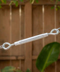 Close-up of High Grade Eye To Eye Turnbuckle Half By Seventeen Inch Aluminum Zinc Coated Hex Grip Cable Tensioner for rigging.
