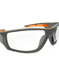 Kick Ass Full Frame Clear Safety Glasses With Smooth Sporty Fit And Badass 99 Point 9 Percent Uv Shielding For Serious Eye Coverage And All Day Grind Comfort In A 144 Pair Bulk Pack, angled view with orange accents.