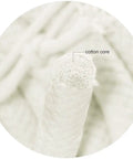 Close-up view of braided cotton rope half inch natural beige soft utility cord fifty feet with visible cotton core