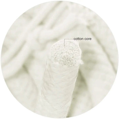 Close-up view of braided cotton rope half inch natural beige soft utility cord fifty feet with visible cotton core
