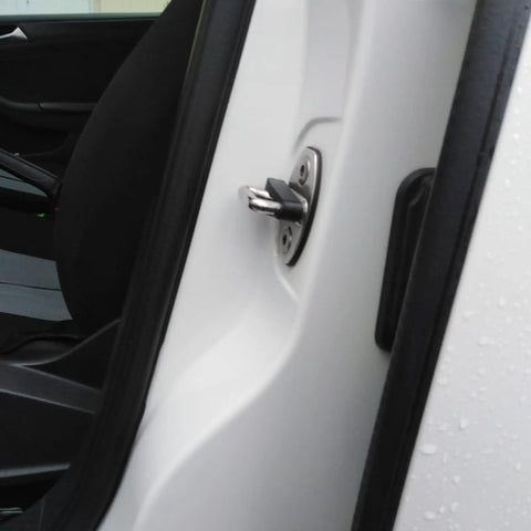 Close-up of a door latch on a Volkswagen with the Premium Door Lock Sound Deadener Soundproof Buffer Pads installed.