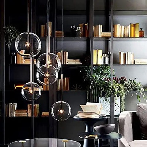 Modern Six Head Glass Pendant Ceiling Light With Warm White Bubble Shades And Brushed Chrome Frame in stylish interior setting.