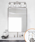 4 Light Vanity Lights In Brushed Nickel Finish With Hammered Glass Shades above bathroom mirror