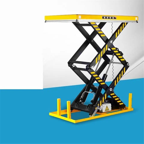 Built Tough Heavy Duty Electric Hydraulic Lift Table With Adjustable Height Workbench Platform For Warehouse Shop Use Rated At 2200 Lb Capacity in yellow and black.