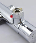 Close-up of Heavy Duty Solid Brass Thermostatic Mixing Valve for Concealed Wall Piping with chrome finish and connection detail.